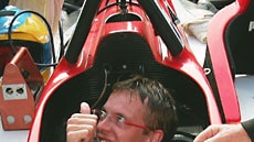 Frenchman Sebastian Bourdais celebrates his Indy 300 victory.