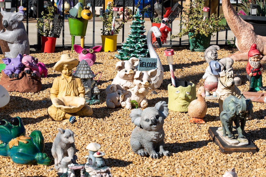 Concrete statues among gravel