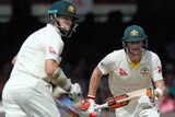 Steve Smith and Chris Rogers run between wickets