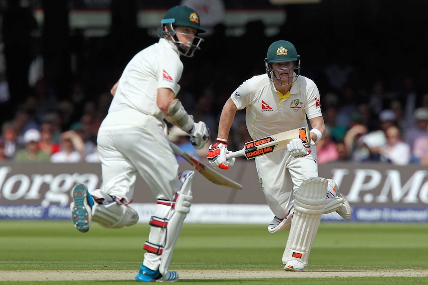 Steve Smith and Chris Rogers run between wickets