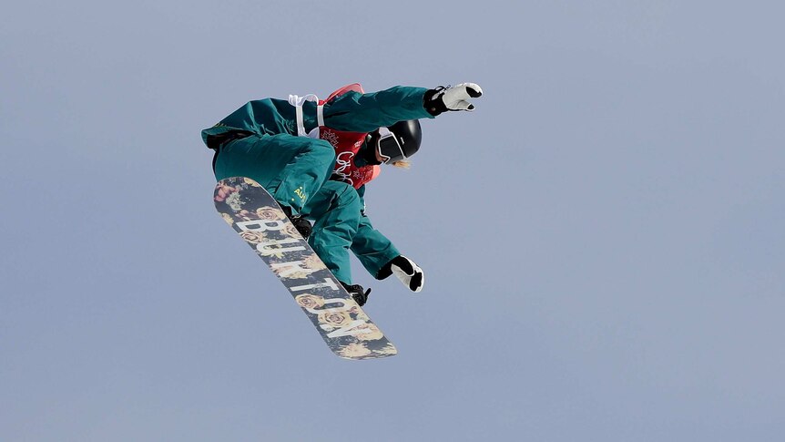 Jessica Rich jumps during big air snowboard qualifying