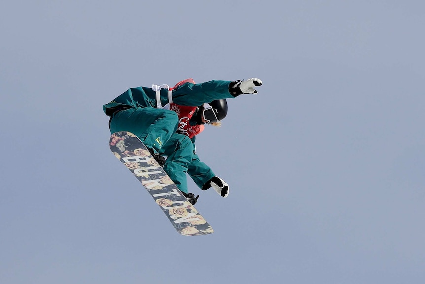 Jessica Rich jumps during big air snowboard qualifying