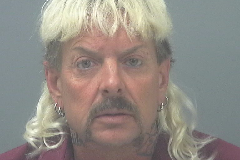 A mugshot of Joseph Maldonado-Passage, or "Joe Exotic".