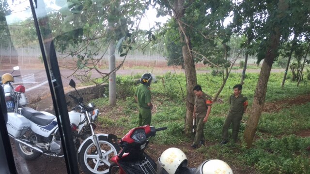 Vietnamese police block access to the memorial site at Long Tan.