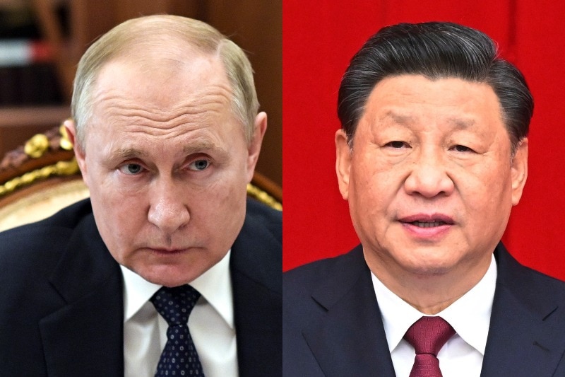 Composite image of Vladimir Putin and Xi Jinping