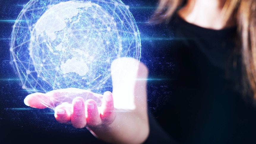 Woman's hand showing earth and network hologram.