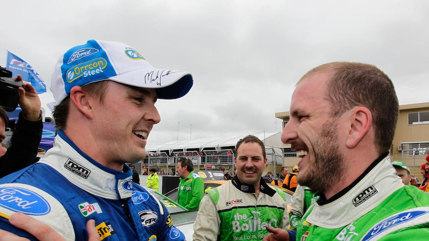 Mark Winterbottom and Ford team-mate Paul Dumbrell celebrate their one-two finish.