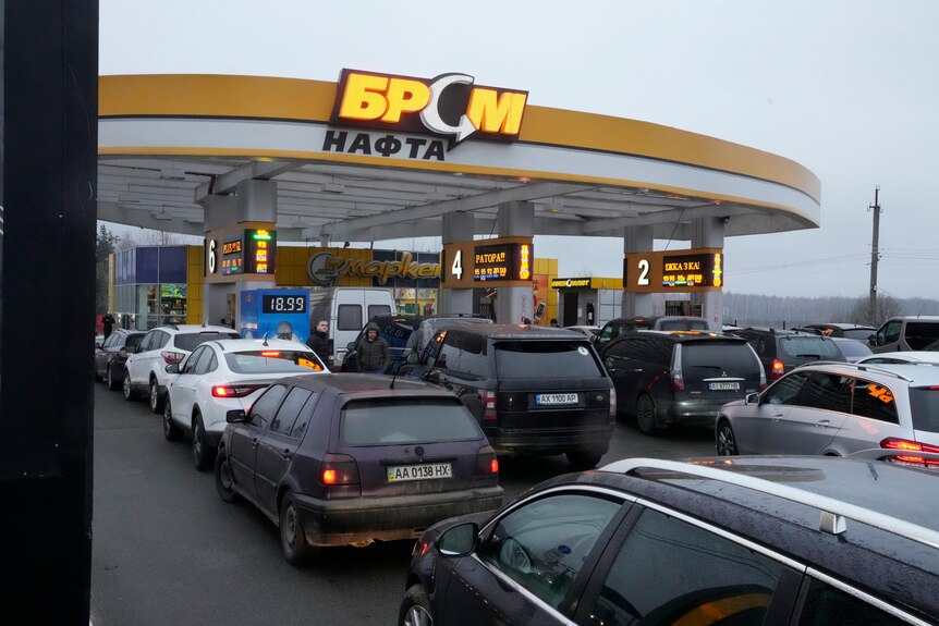 Queues of vehicles line up at a petrol station in Kyiv, Ukraine.