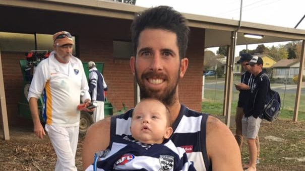 Former captain of Lockington-Bamawm United in north central Victoria, Matt Bongiovanni with his son Jackson.