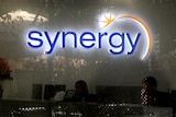 A neon Synergy sign inside the company's Perth office.