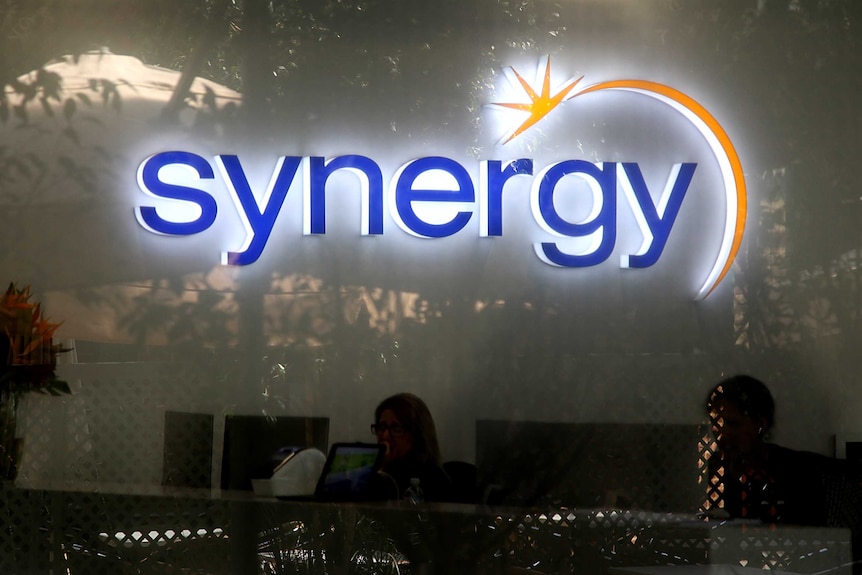 A neon Synergy sign inside the company's Perth office.