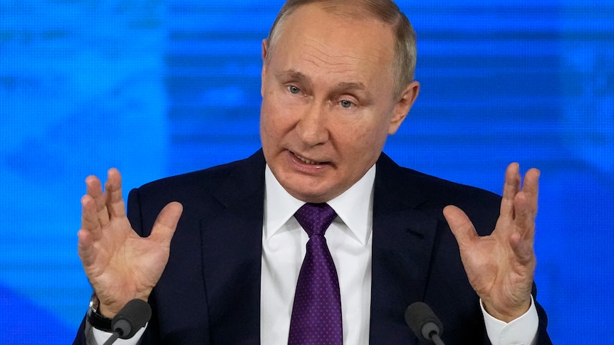 The Russian President gestures with his hands