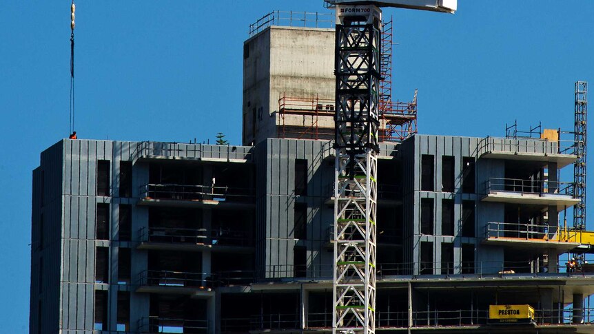 Crane on a Melbourne Southbank apartment building construction site.
