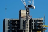 Crane on a Melbourne Southbank apartment building construction site.