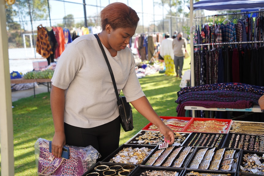 Adelite shopping at a local market 