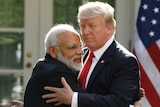 Narendra Modi hugging Donald Trump in the Rose Garden of the White House