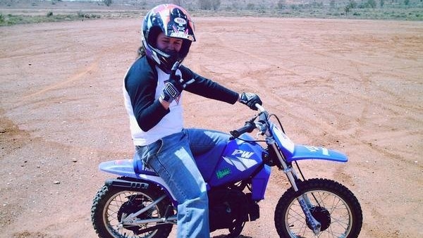 Daisy Hoskins young on a motorbike