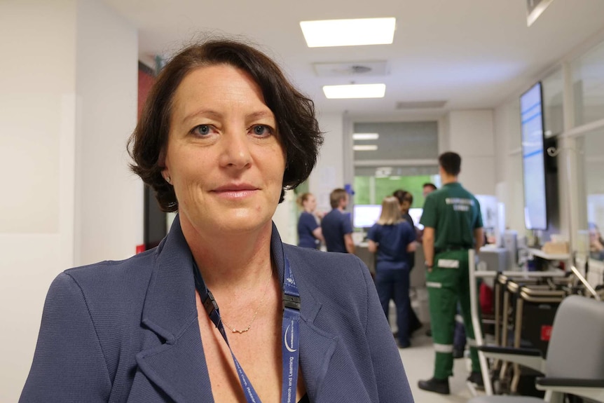 Kirsty Buising poses for a photo in the corridor of the Emergency Department