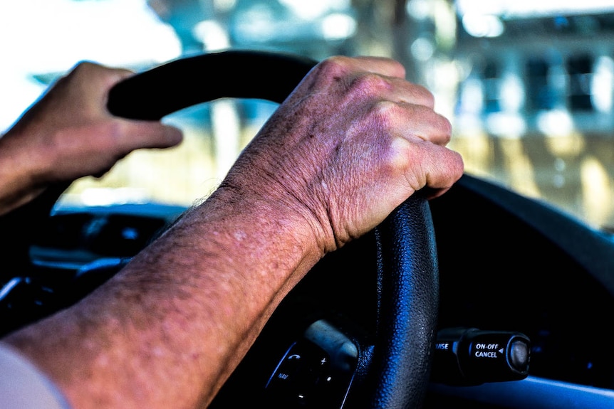 Hands on steering wheel