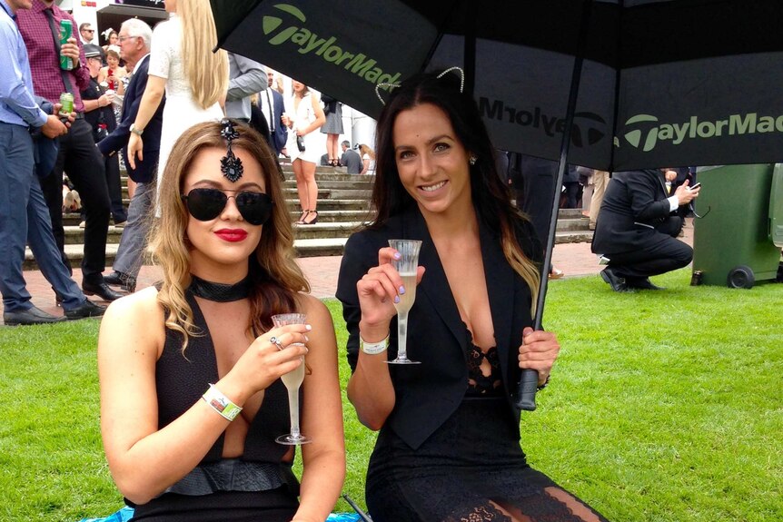 Women enjoying champagne at Derby Day