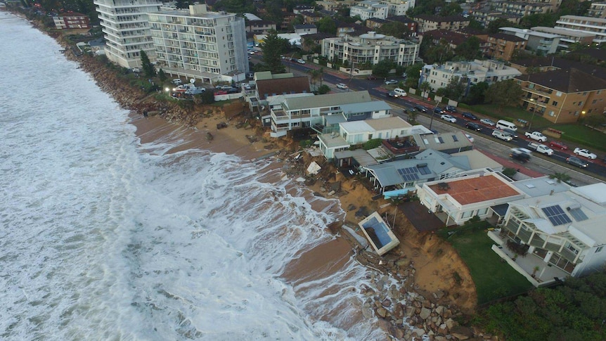 Drone flies above a battered Collaroy