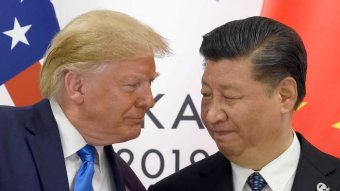 President Donald Trump, left, meets with Chinese President Xi Jinping.