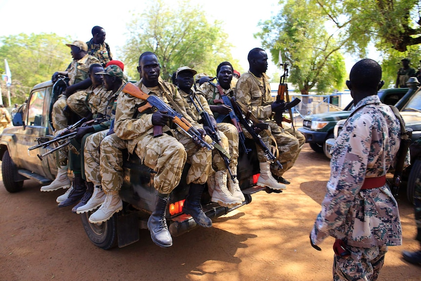 South Sudan army soldiers ride into Bor.