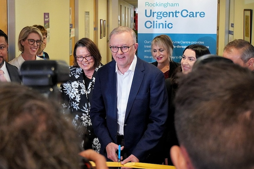 Prime Minister Anthony Albanese cutting the ribbon at the opening of the urgent care clinic.