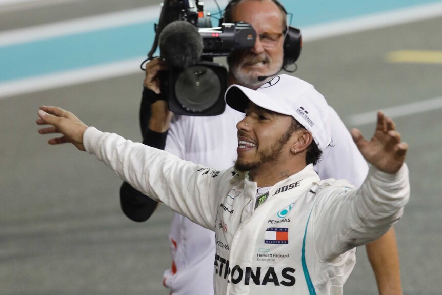 Lewis Hamilton celebrates his Abu Dhabi win