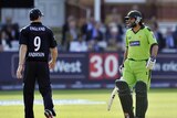 Tensions rising: James Anderson (l) exchanges words with Pakistan's Shahid Afridi.