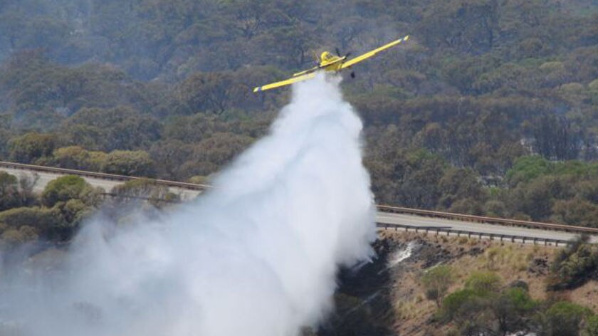 A waterbomber assists in a bushfire