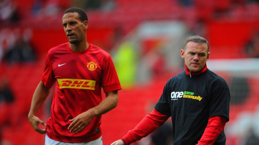 Rio Ferdinand (L) refuses to wear a t-shirt for the Kick It Out anti-racism campaign.