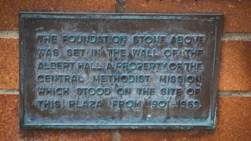 A plaque on the wall.
