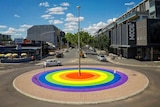 An aerial shot of a rainbow roundabout.