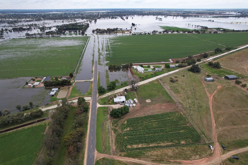 Aerial shot of flooded flat farmland.