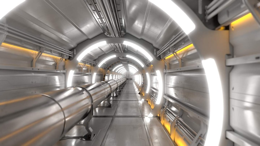 A concept image of the interior of the Future Circular Collider tunnel showing the long metal pipe of the accelerator.