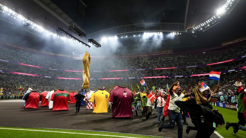 Artists perform during the opening ceremony for the World Cup