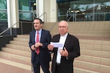 Bishop Heenan apologising outside the Royal Commission