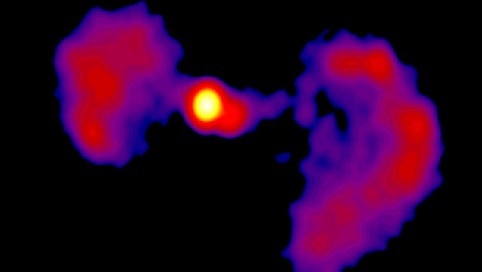 An image generated by a radio telescope shows a central circle with a large, irregular cluster on each side.