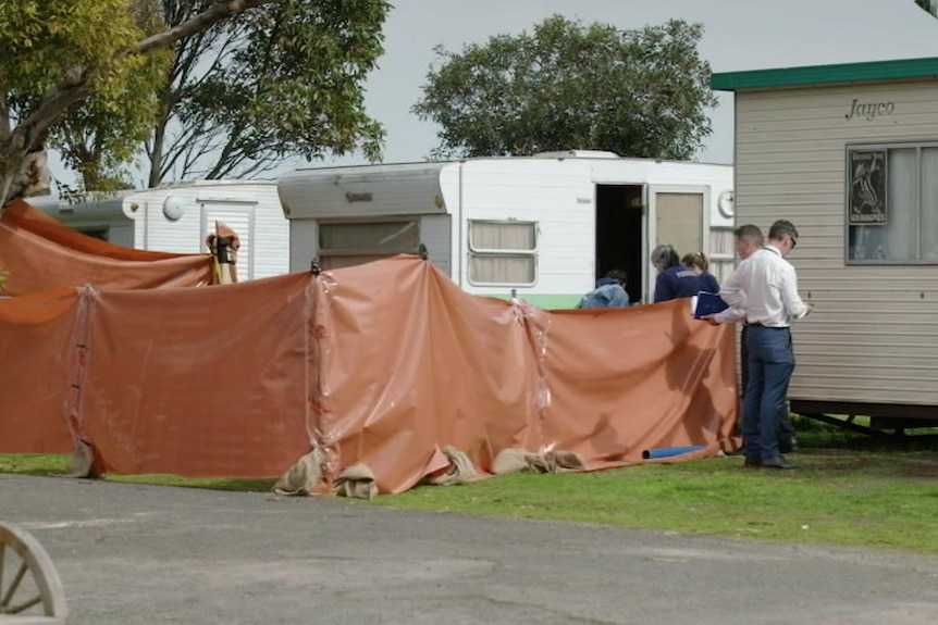 A tarp around a caravan