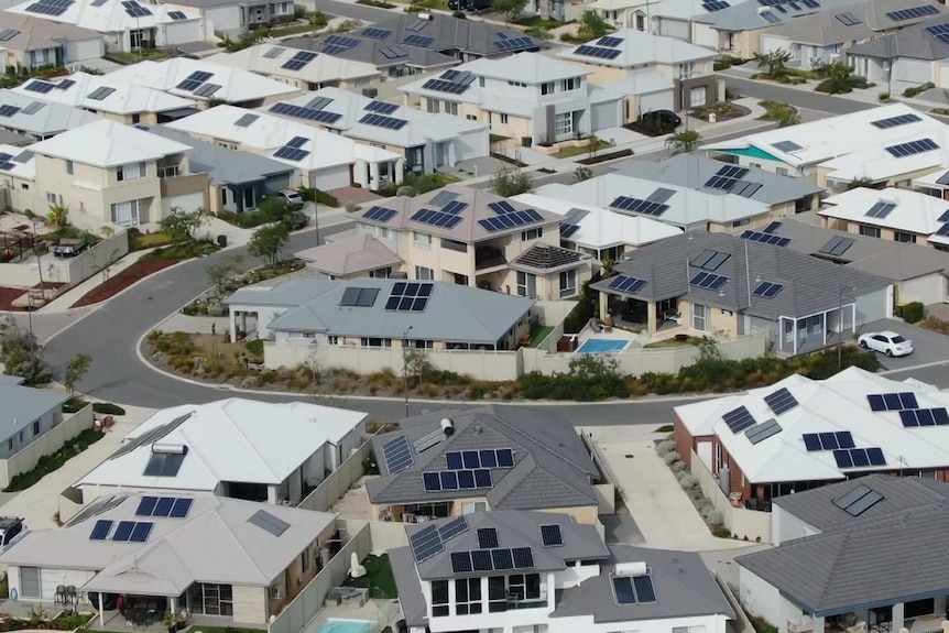 Solar panels on multiple suburban roofs