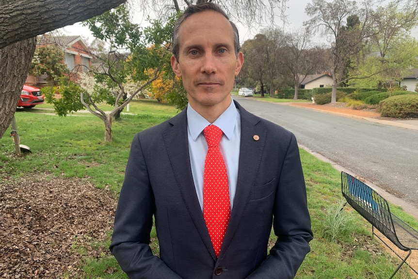 Andrew Leigh standing in a suburban street in Canberra during lockdown in September 2021.