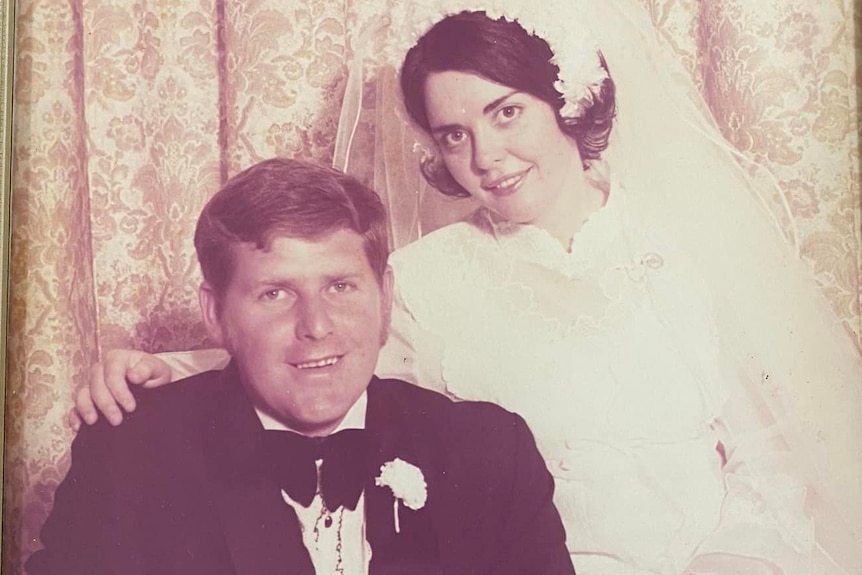 Black and white photo of bride and groom