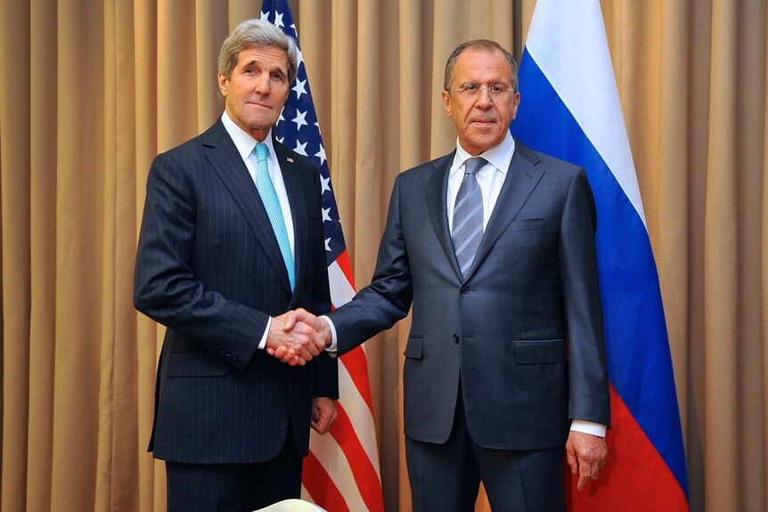 John Kerry shakes hands with Sergei Lavrov after Ukraine talks in Geneva