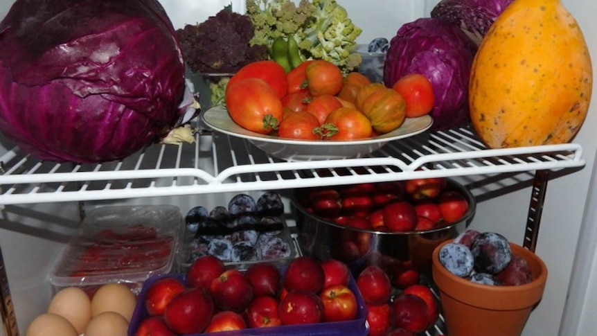 Fruit and vegetables in a fridge.