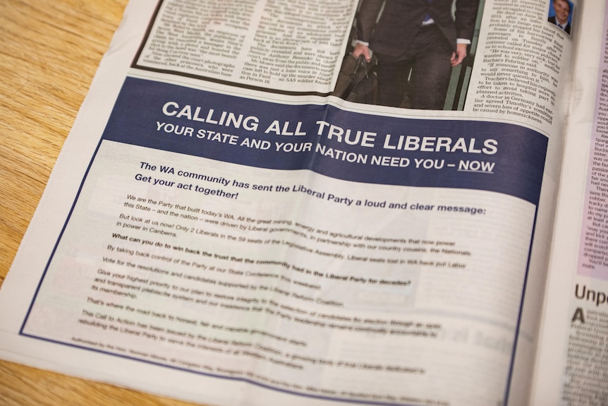 A half-page newspaper ad reading 'Calling all true liberals'.