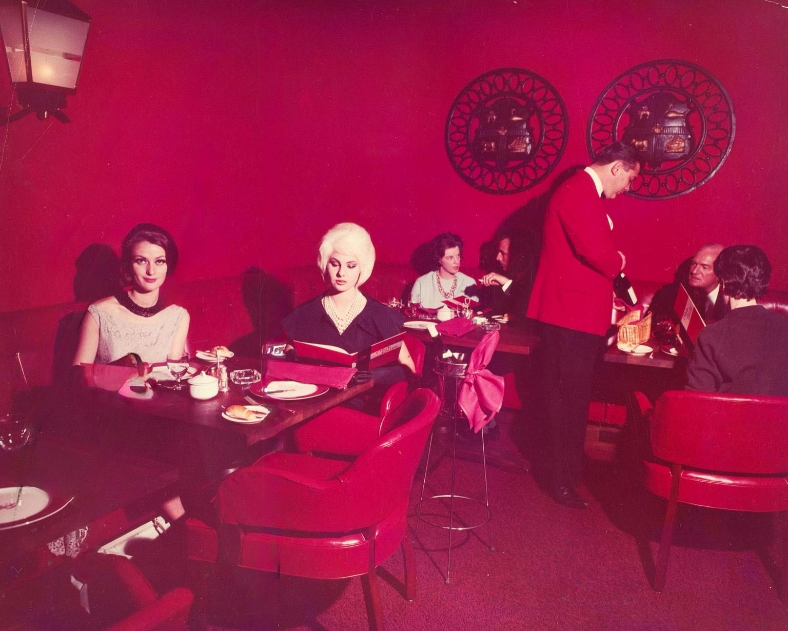 Bright red decor at the old Southern Cross Hotel in the 1960s