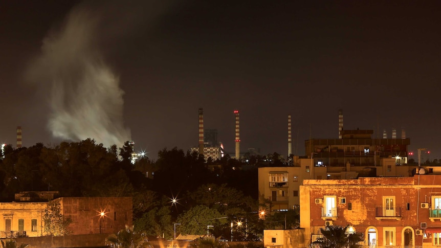 The Ilva steel plant is seen next to the Tamburi district, Taranto.