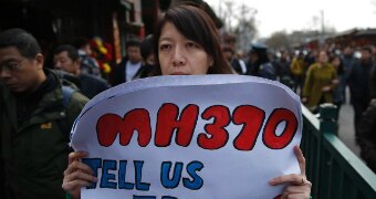 Families of passengers onboard missing flight MH370 remember one year on