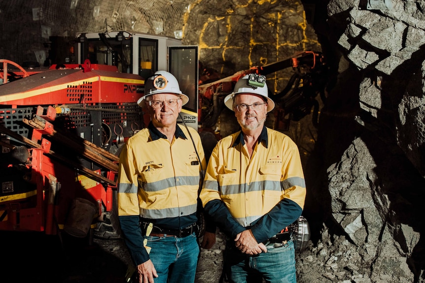 Mincor chairman Brett Lambert and Mines Minister Bill Johnston standing in an underground mine.